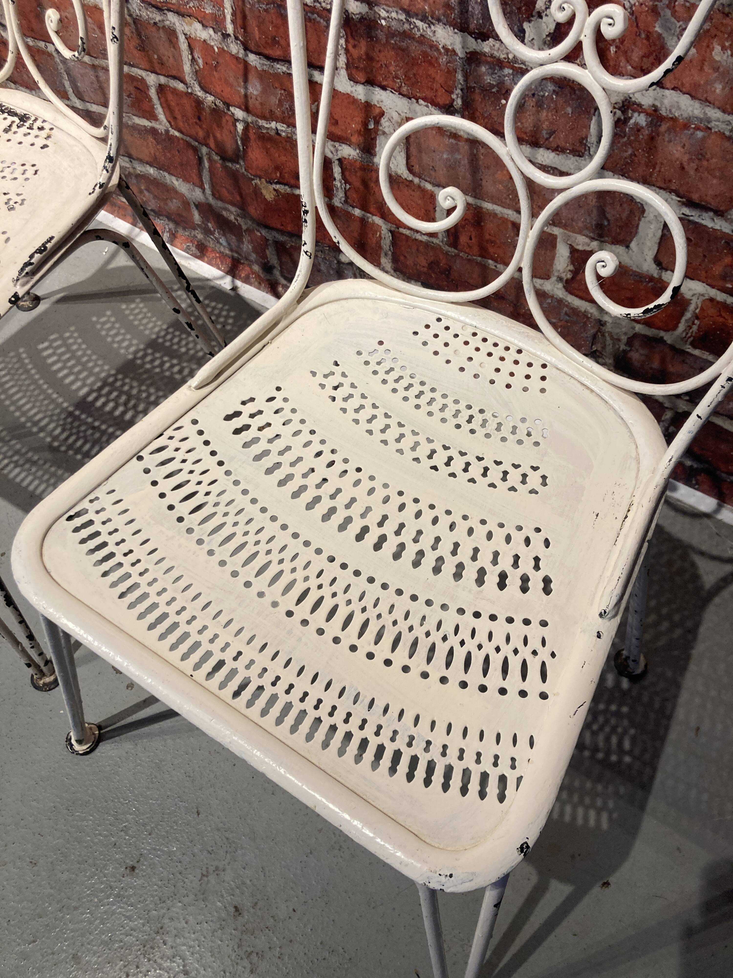 Wrought iron garden set painted white