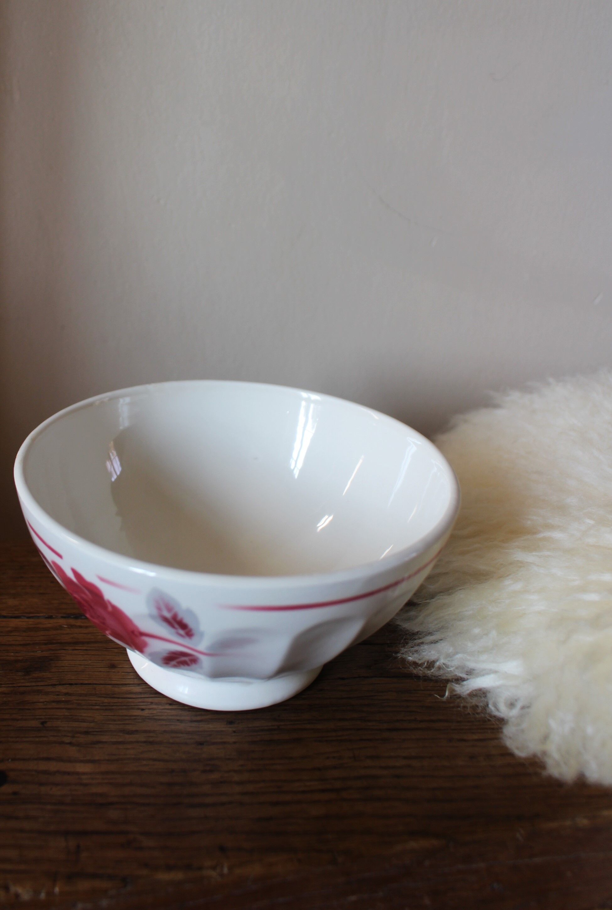 Old standing bowl pink red blue foliage