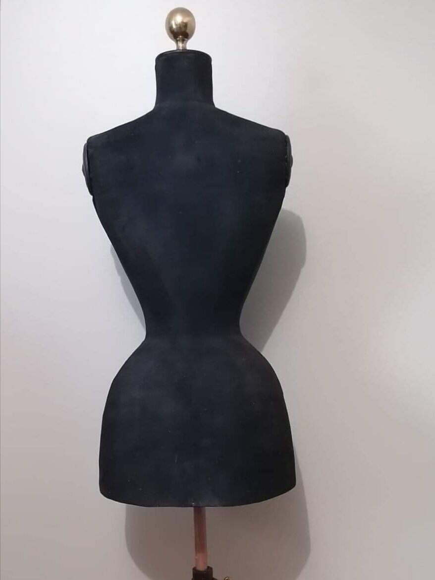 Old bust of seamstress called "wasp size"