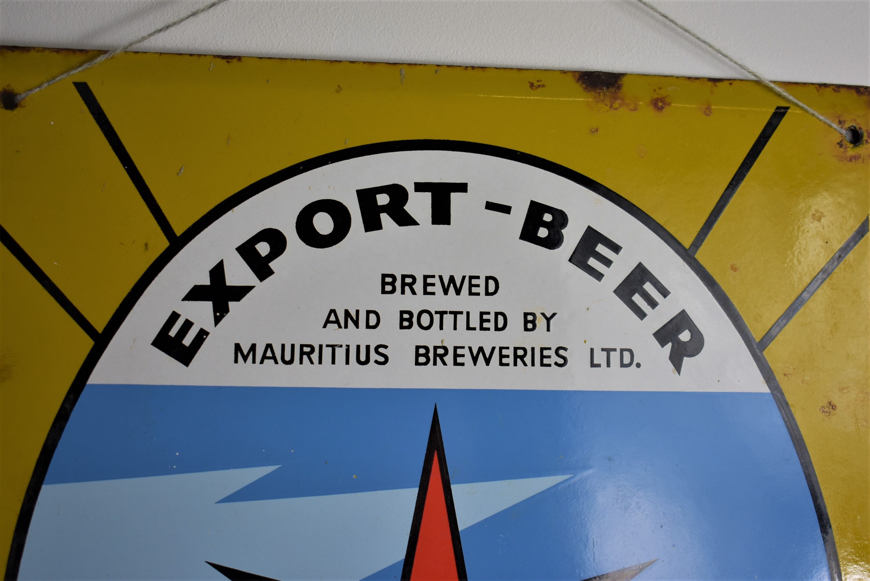 Stella Pils beer enamelled plate