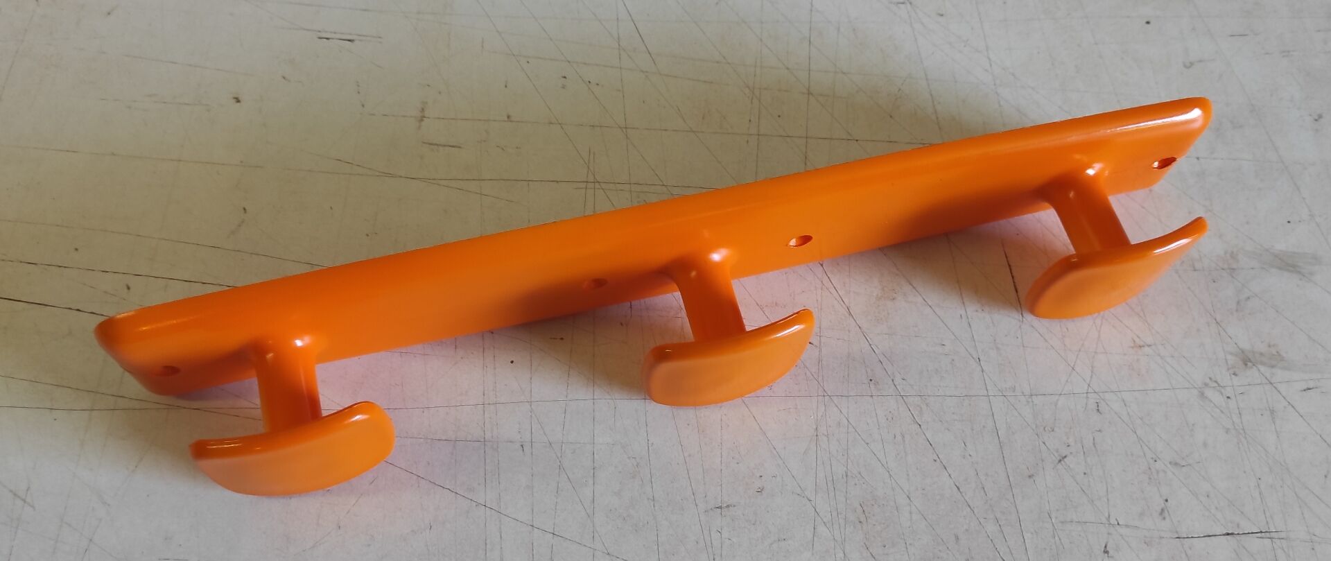 Orange wall coat rack by Syla - 1970s