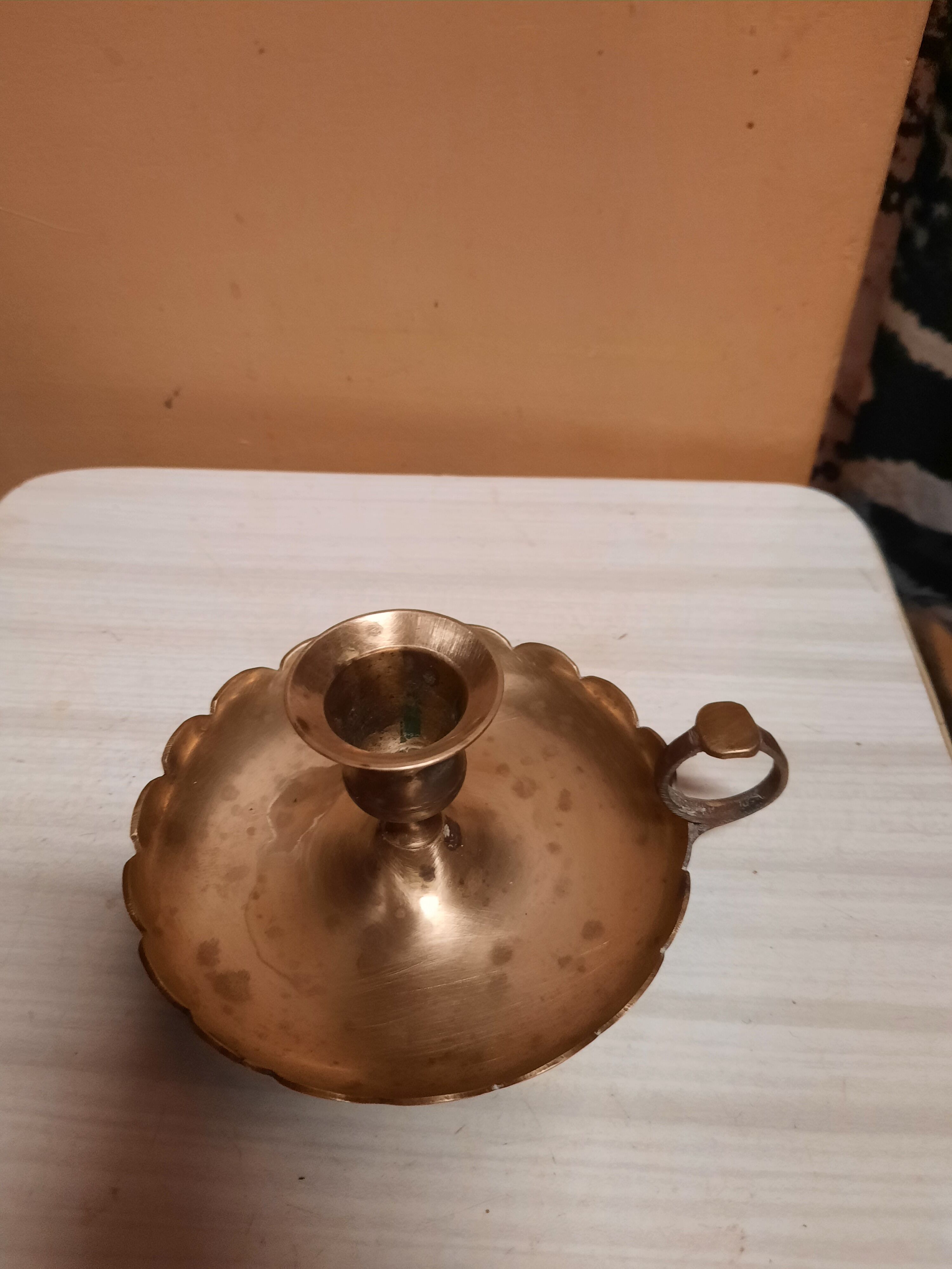 Golden hand candle holder