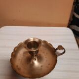 Golden hand candle holder