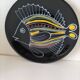 Black faience plate with stylised fish, Ty Breiz spirit from the 1960s.