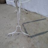 White wrought iron cradle