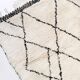 Berber rug Beni Ouarain with black graphic patterns 301x193cm
