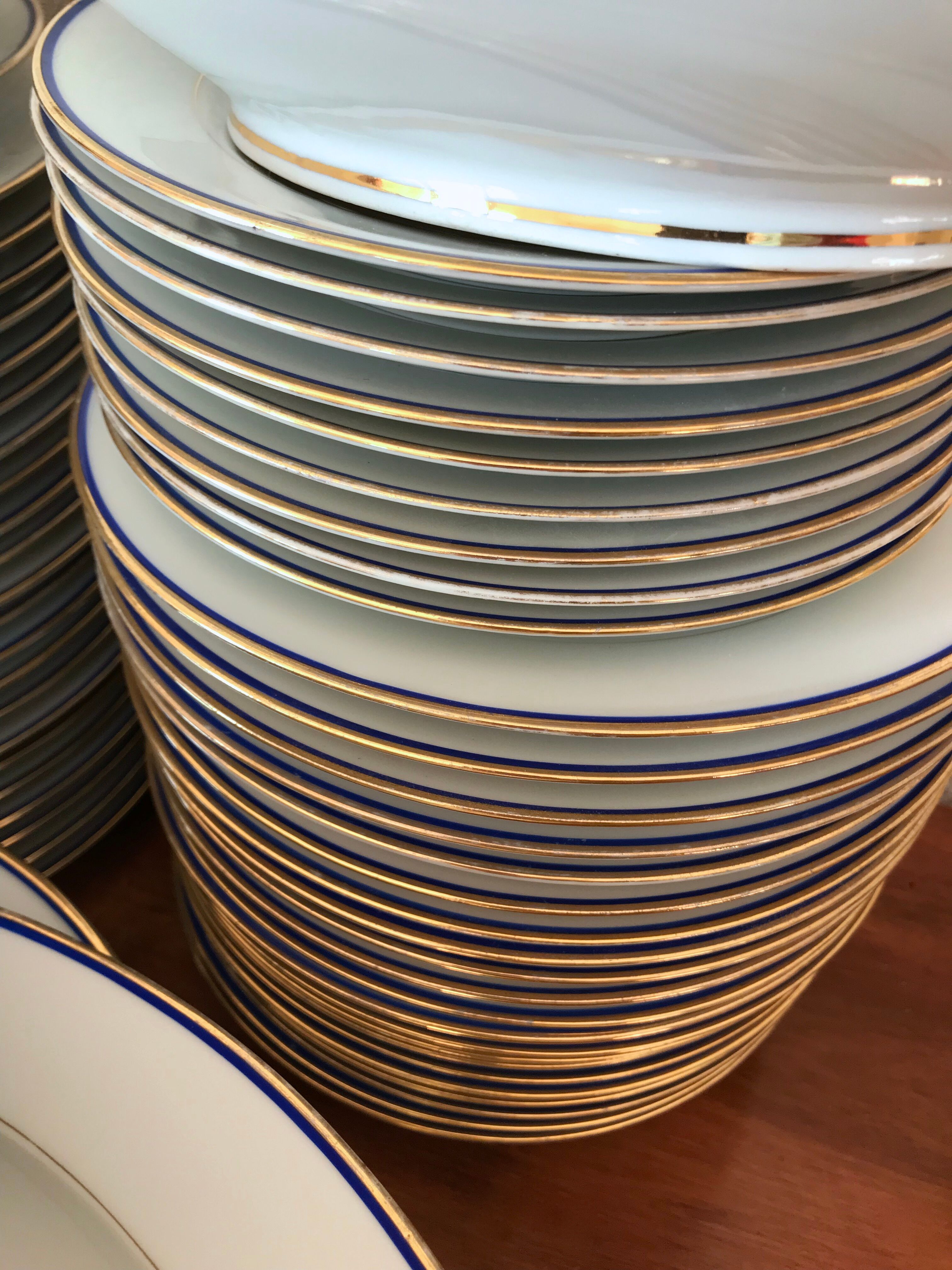 table service art deco limoges porcelain white border blue and gold 61 pieces signed