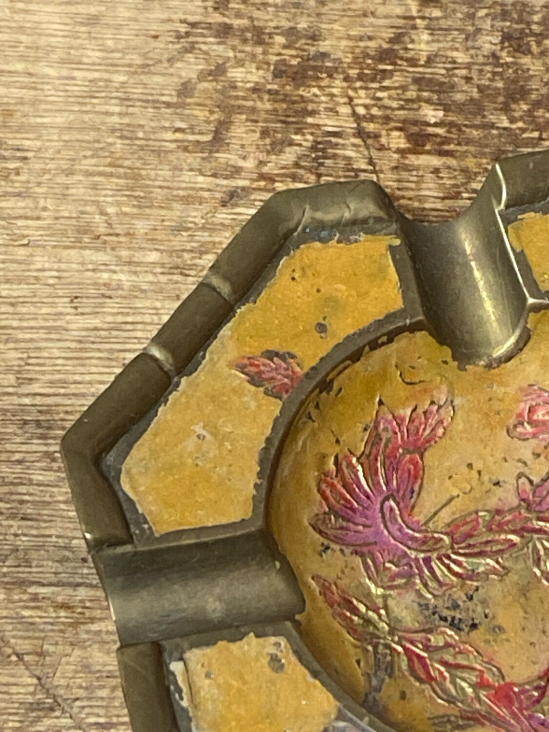 Enameled brass ashtray with floral decoration