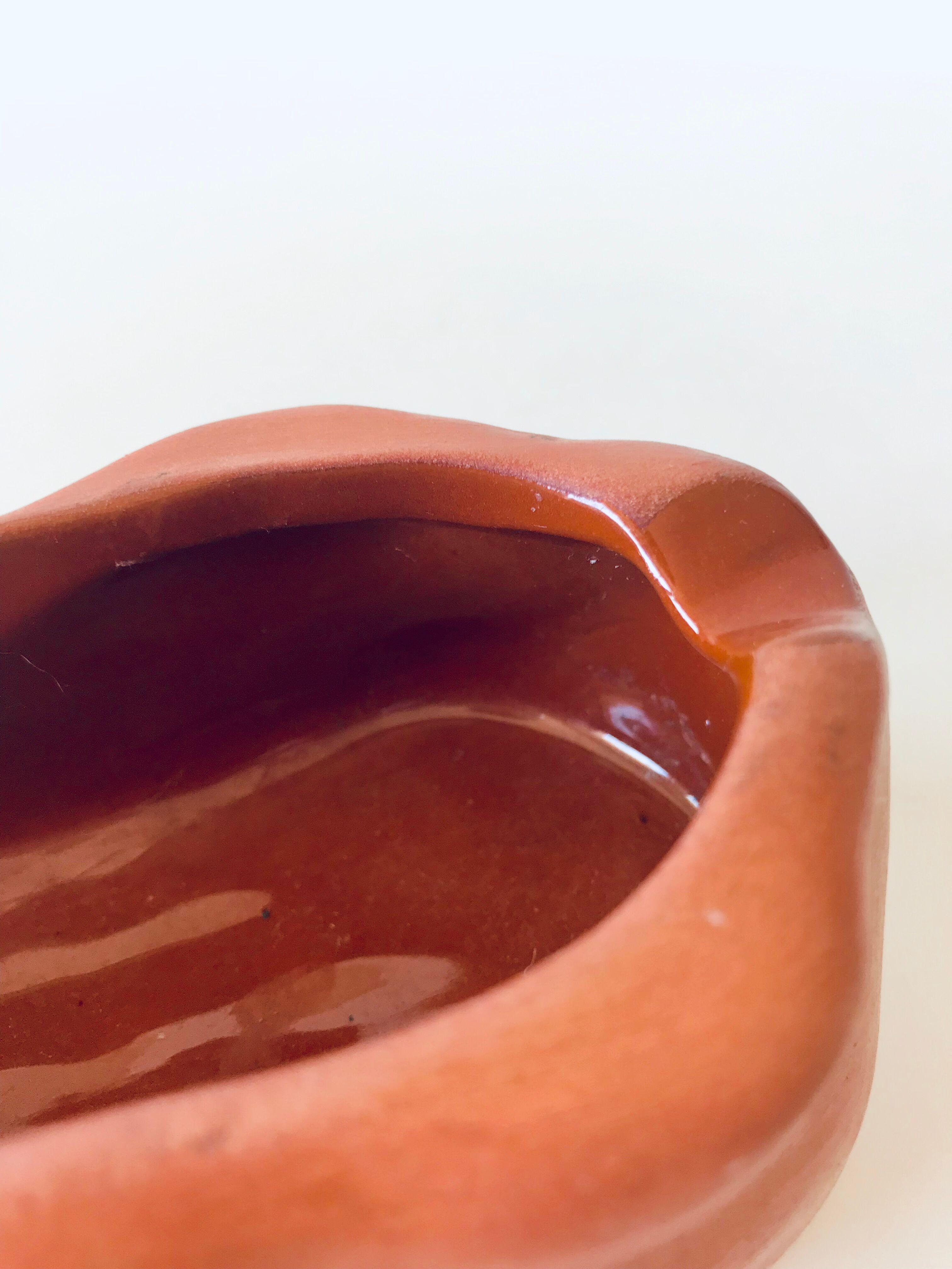 Foot ashtray signed Jean Marais