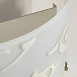 Polished and screen-printed glass sconce by eglo