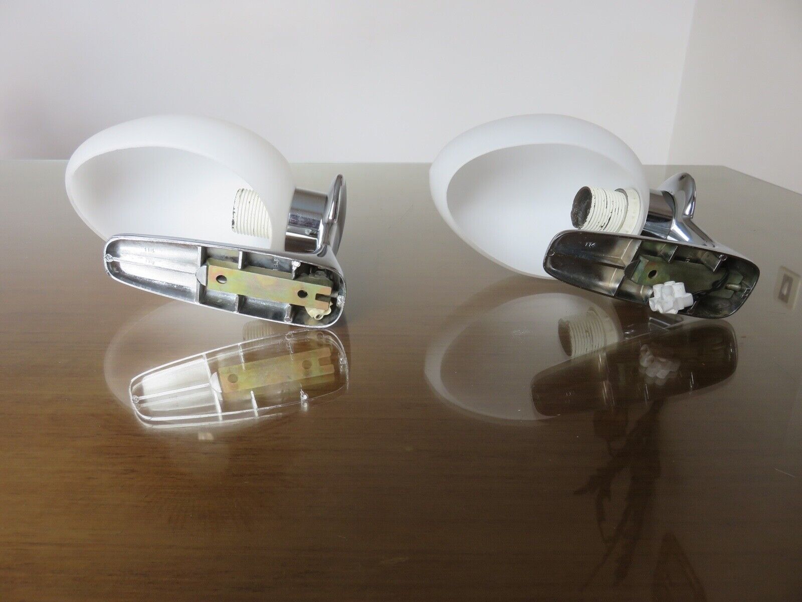 Wall lamps in chromed metal and opaline glass