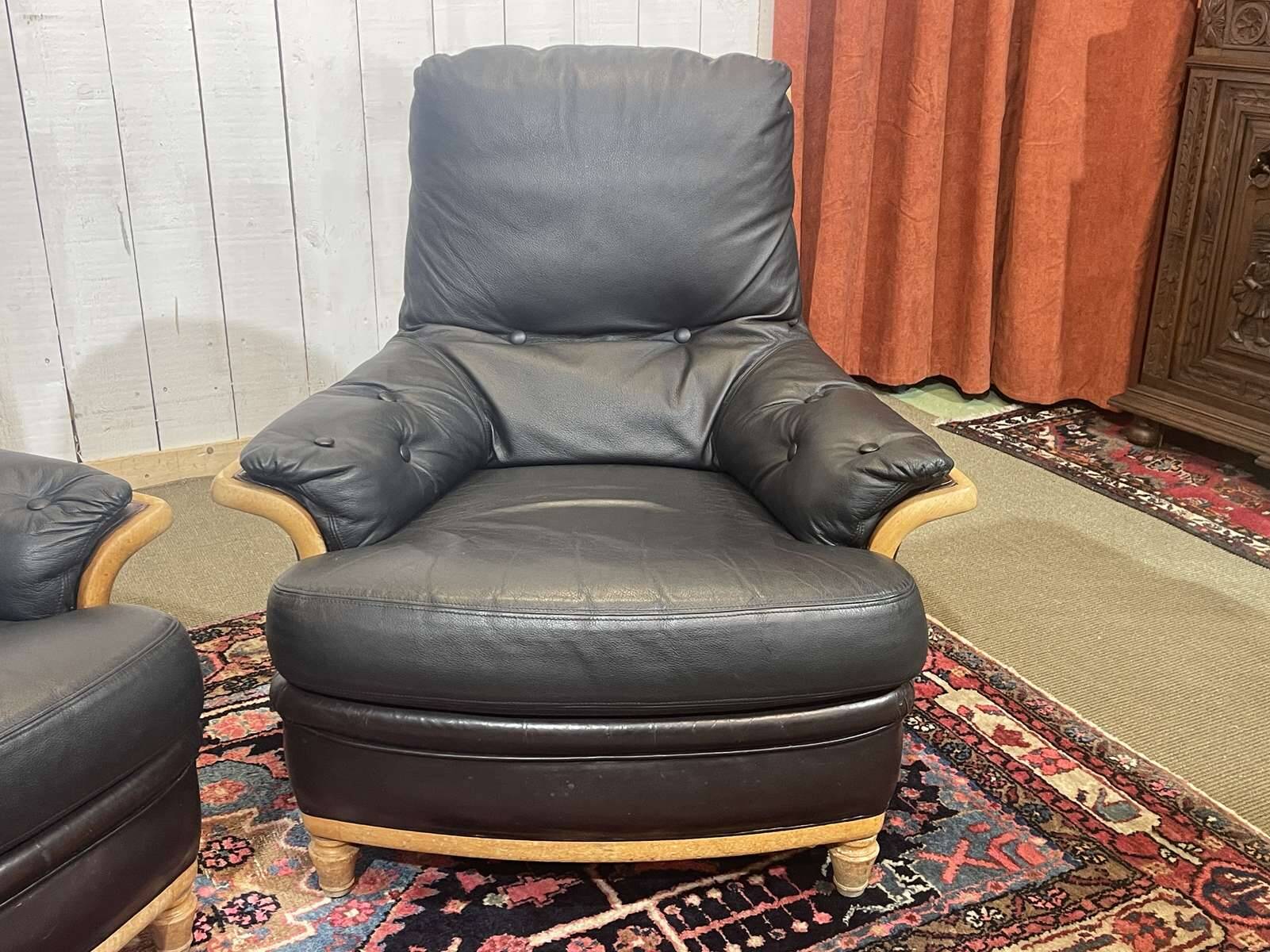Pair of leather and beech armchairs from the 1970s.