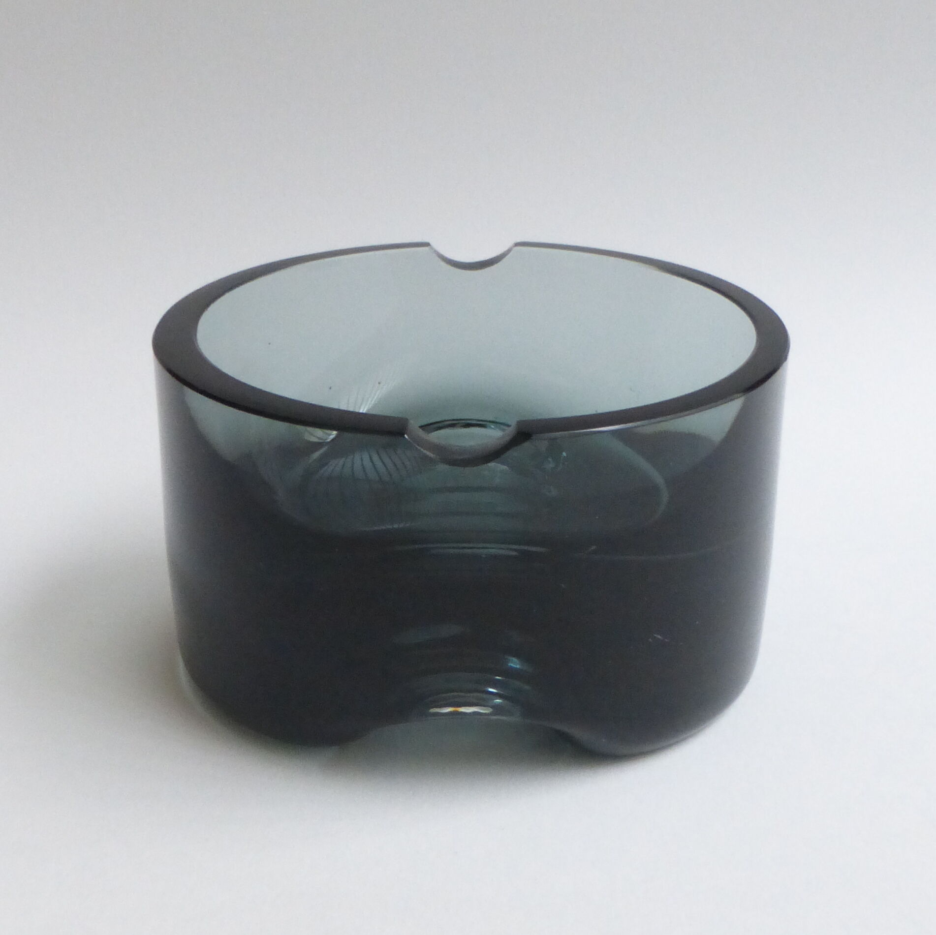 Scandinavian ashtray in 1970's moulded smoked glass