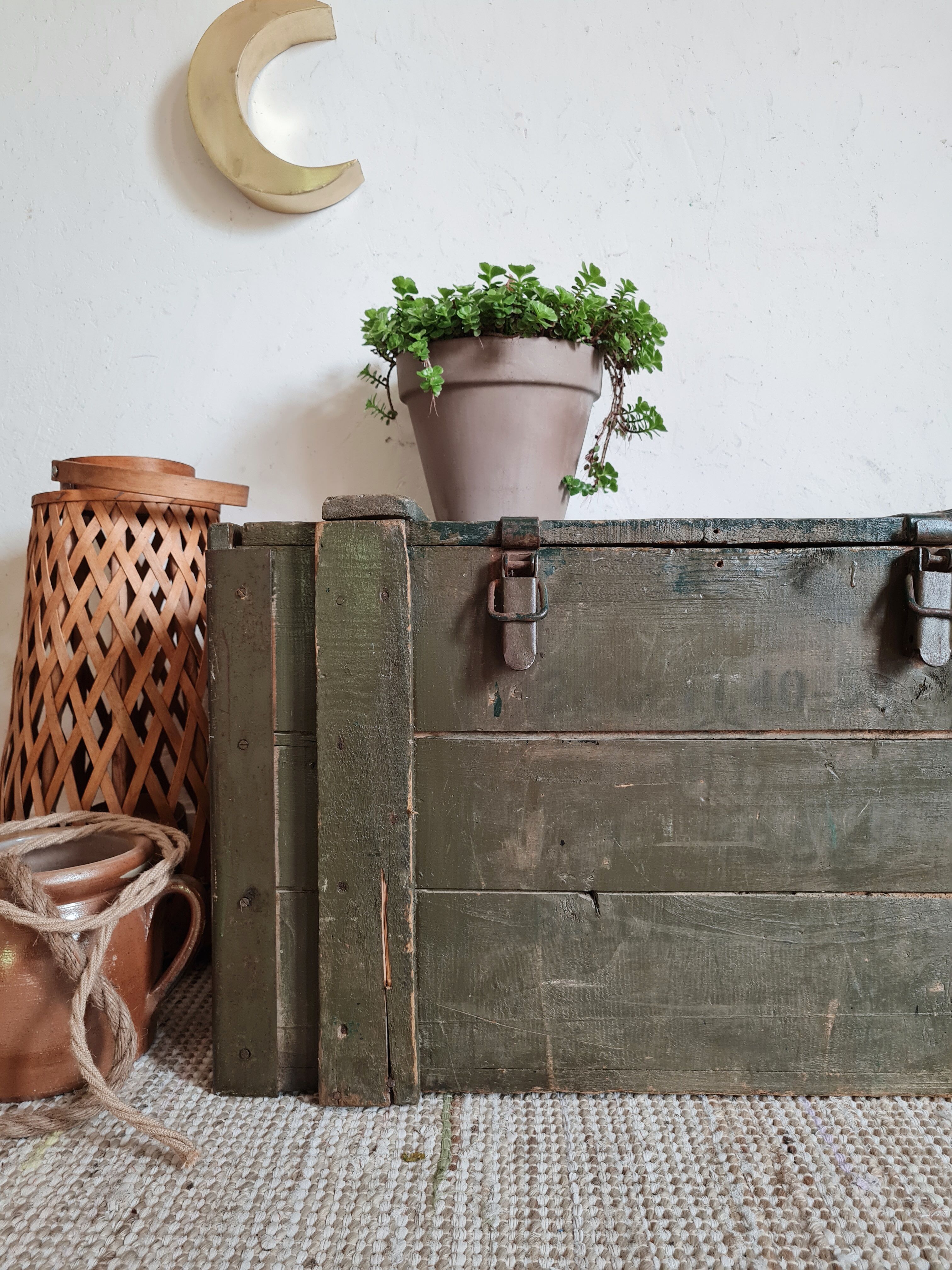 Old green military crate or trunk