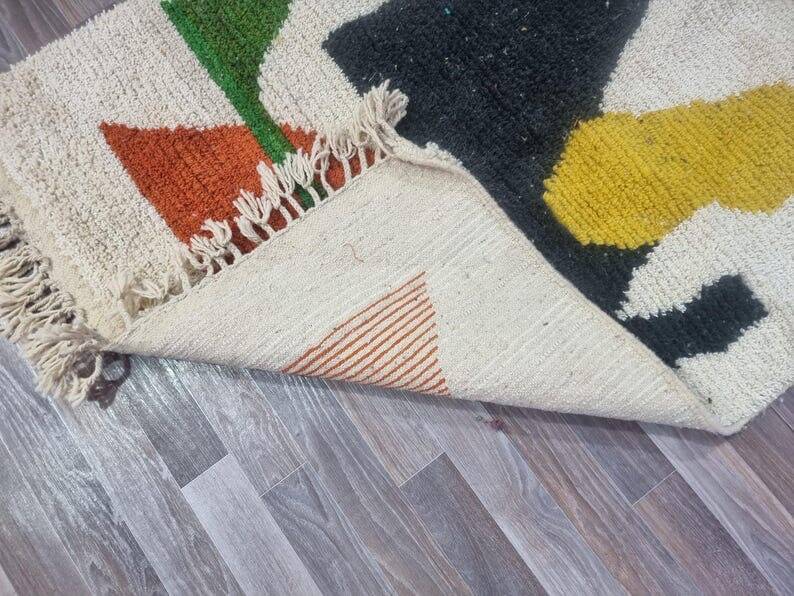 Handmade traditional Moroccan rug with colourful patterns, size 140x260 cm.
