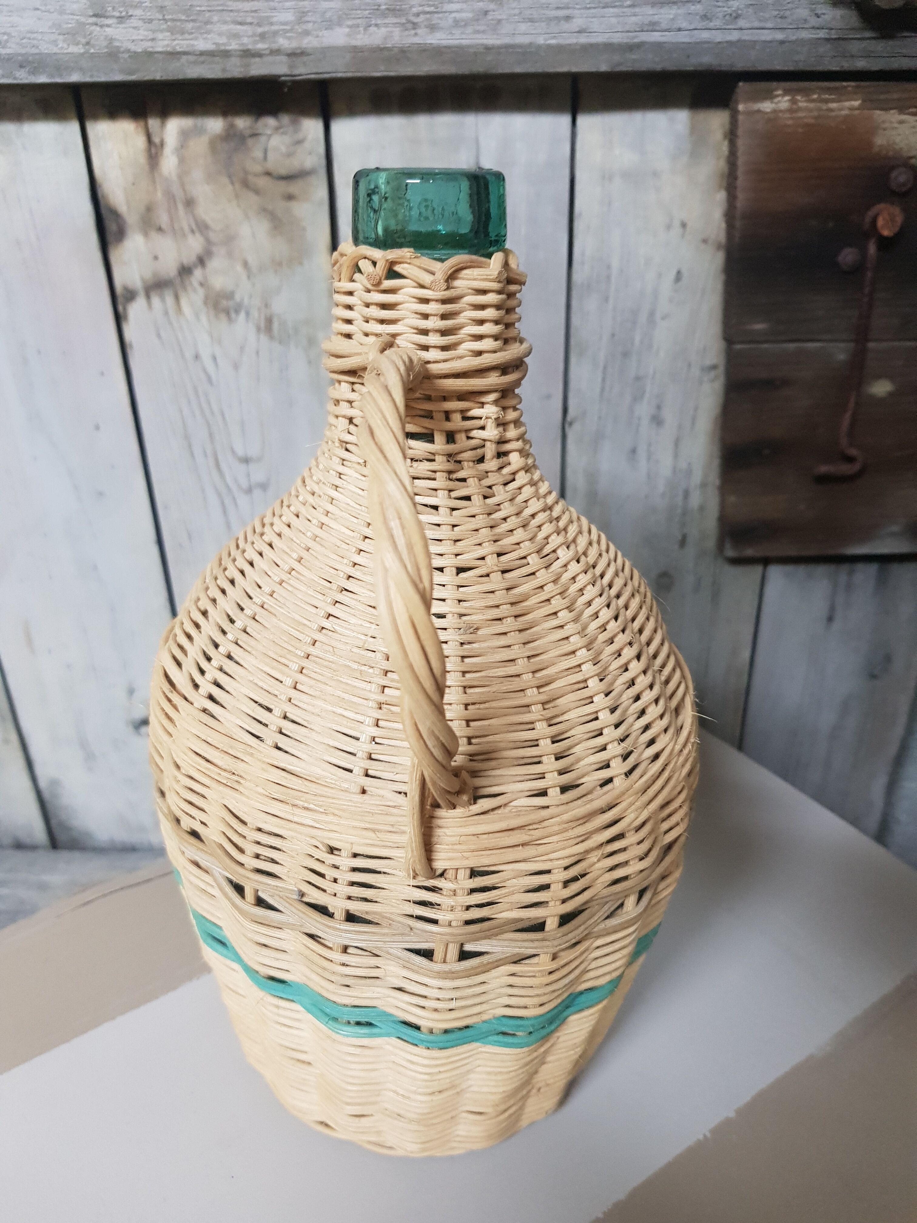 Vintage wicker demijohn
