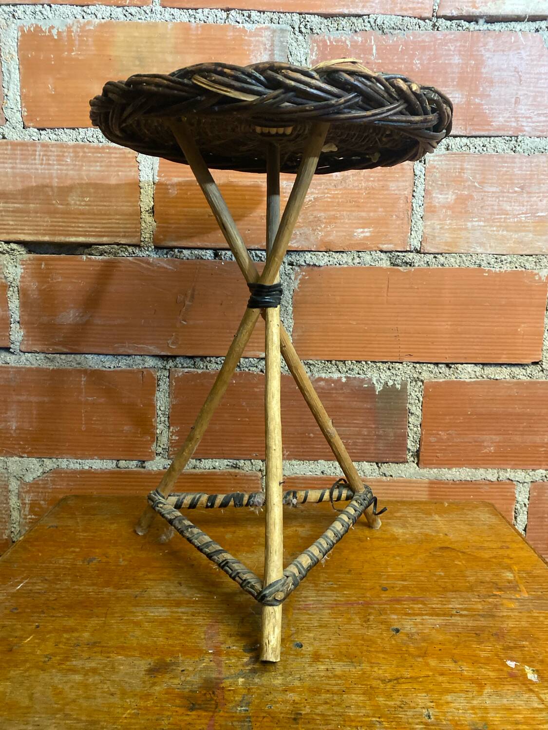 Vintage wooden tripod side table + woven wicker top