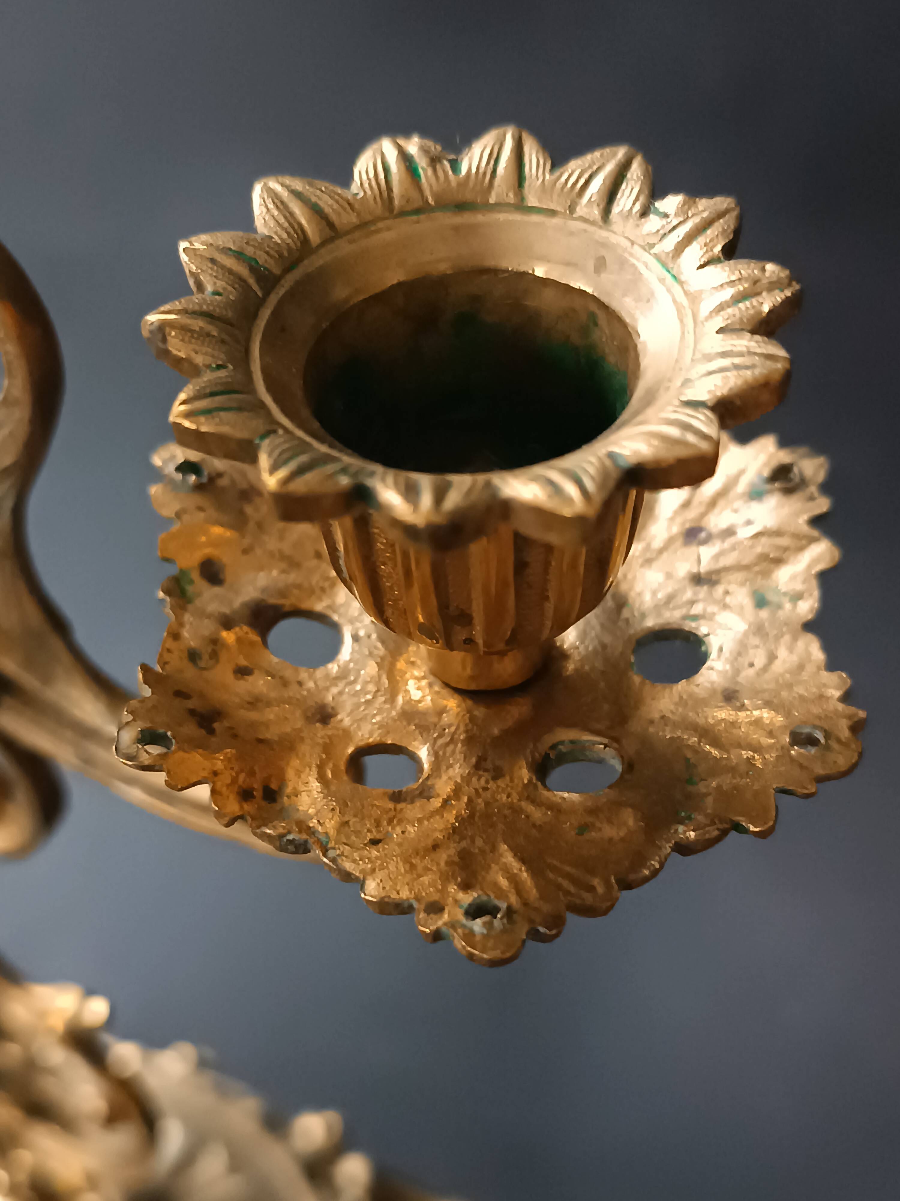 Antique three-light openwork brass church candelabrum.
