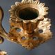 Antique three-light openwork brass church candelabrum.