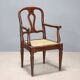 Antique walnut armchair with caned seat, Italy, 18th century