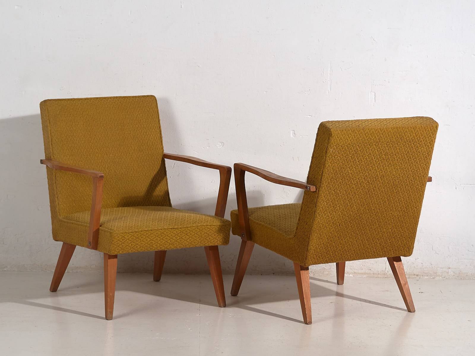 2 armchairs in wood and ochre fabric, 1950