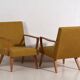 2 armchairs in wood and ochre fabric, 1950