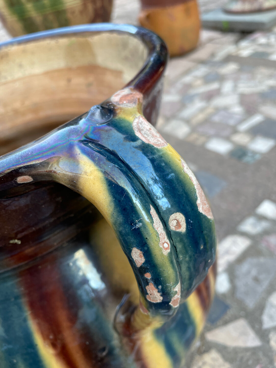 Old flower jar with two glazed earth handles