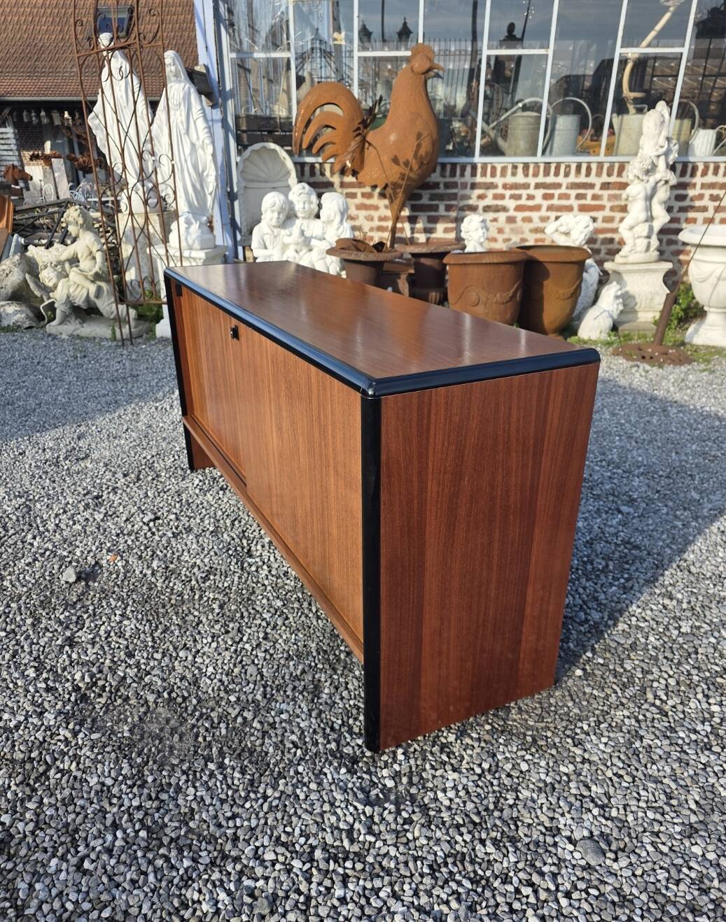 Vintage sideboard with sliding doors from the 60s