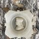 Three alabaster profiles of men, Italy around 1880