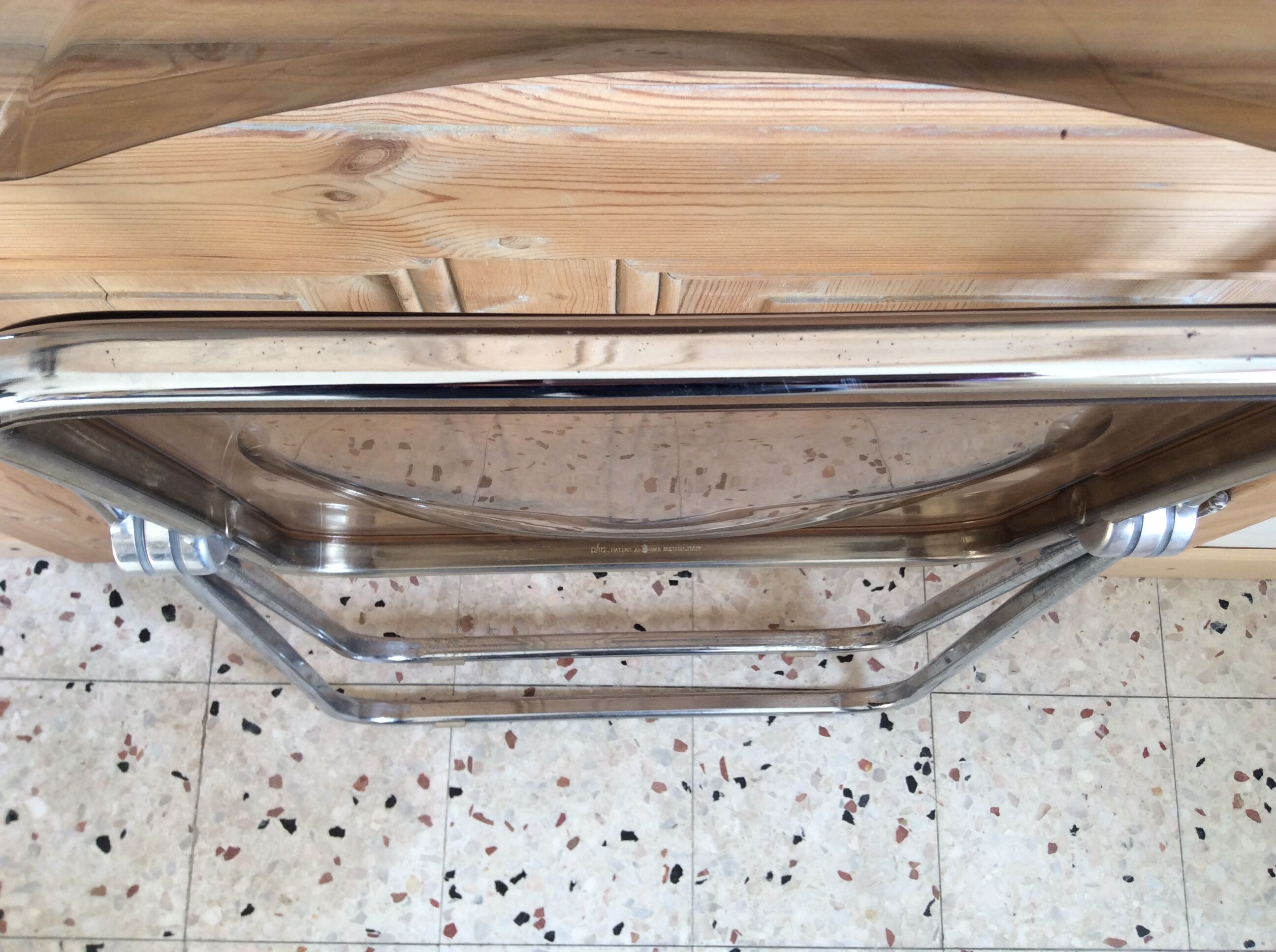 Folded chair by Giancardo Piretti for Castelli