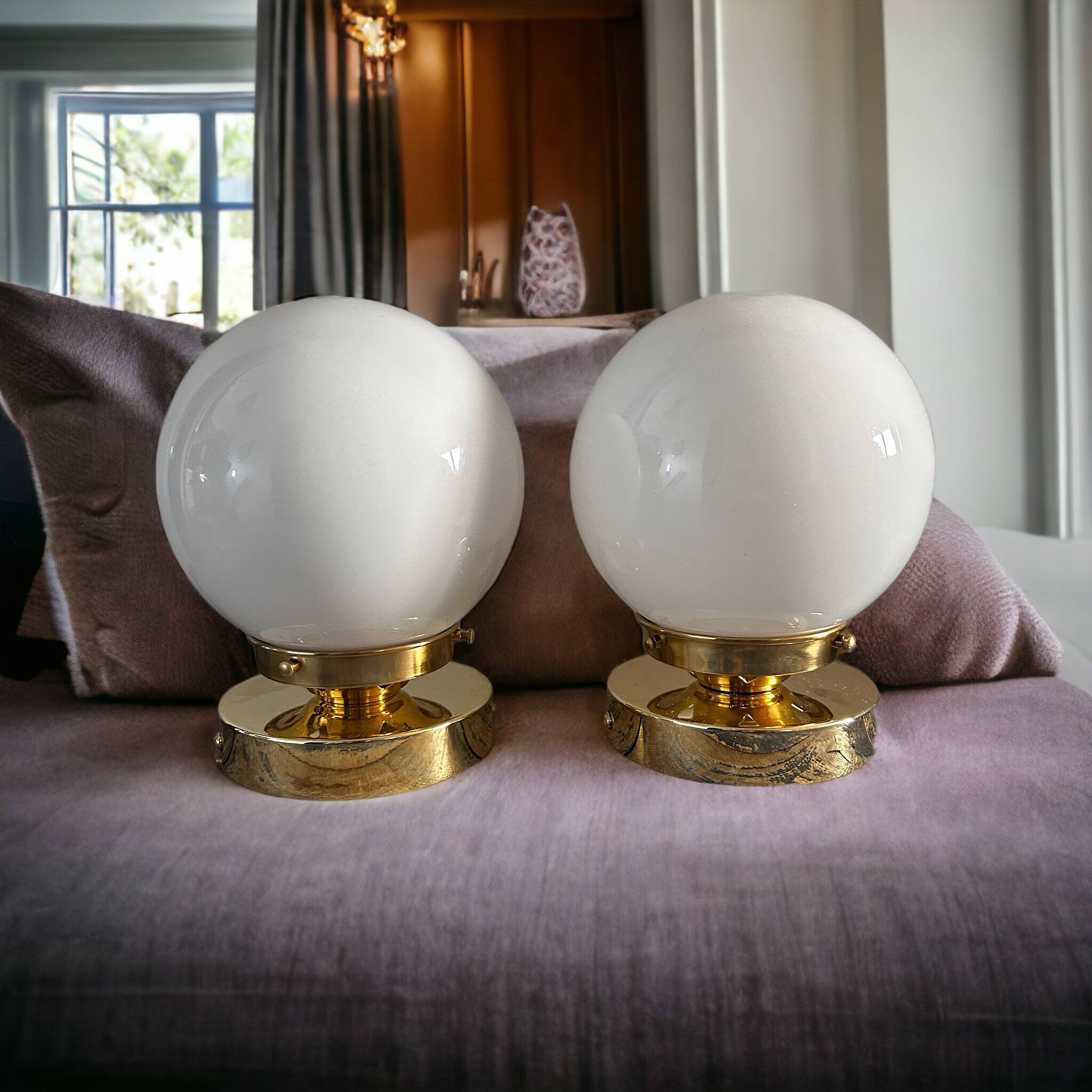 Set of white opaline globe sconces