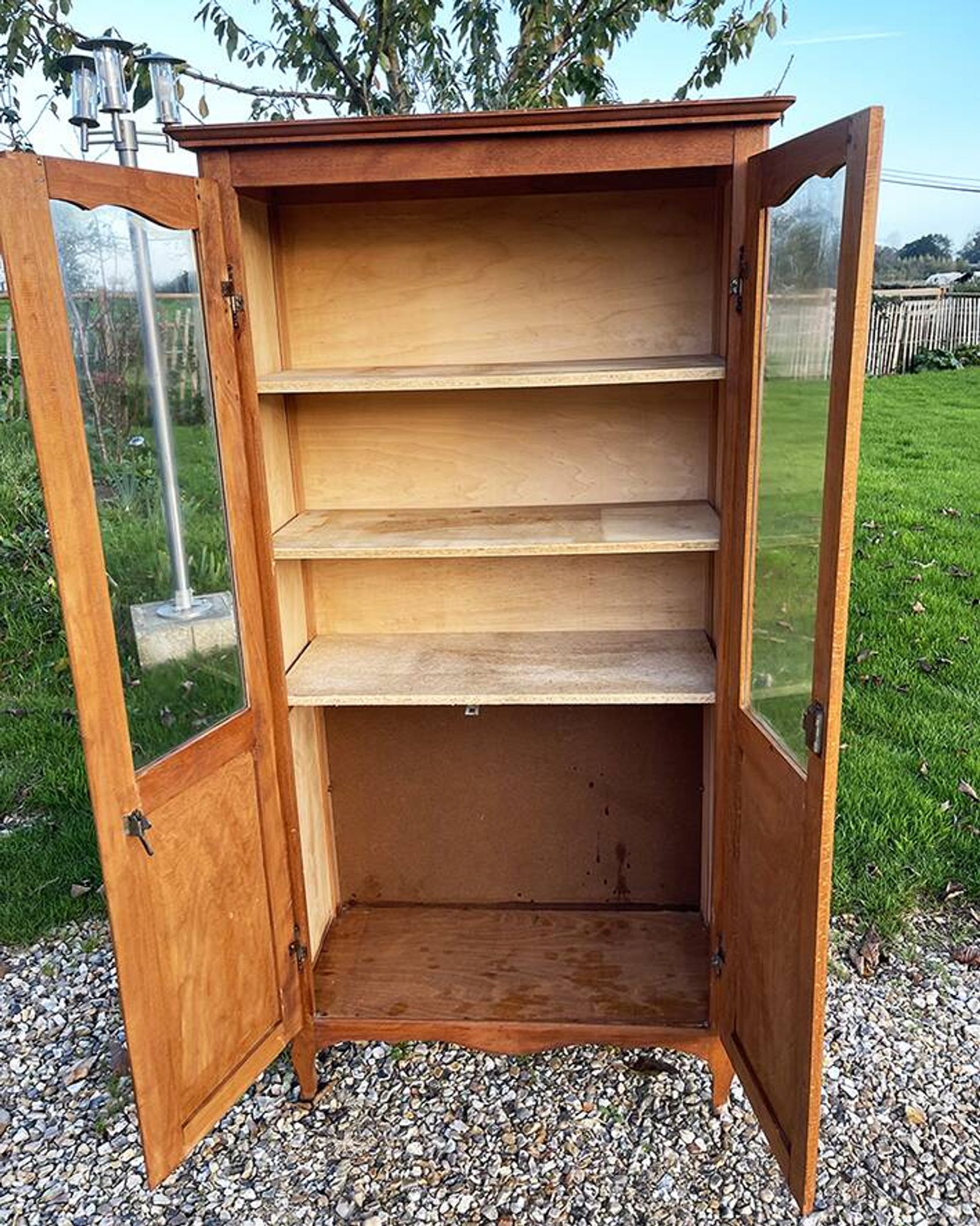 Old light wood display cabinet