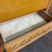 Wardrobe, desk, wooden and rattan chest of drawers, 1960s.