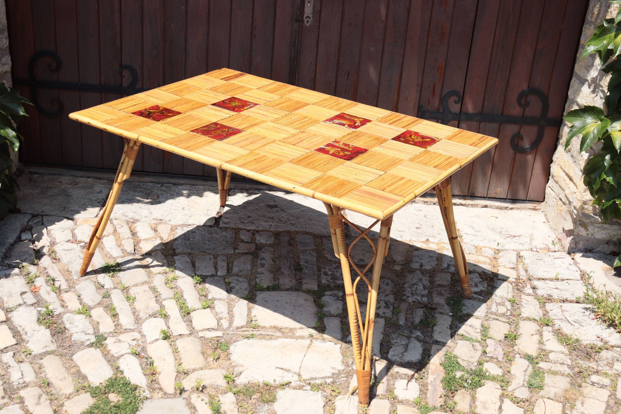 Audoux Minet attribution  rattan and ceramic dining table