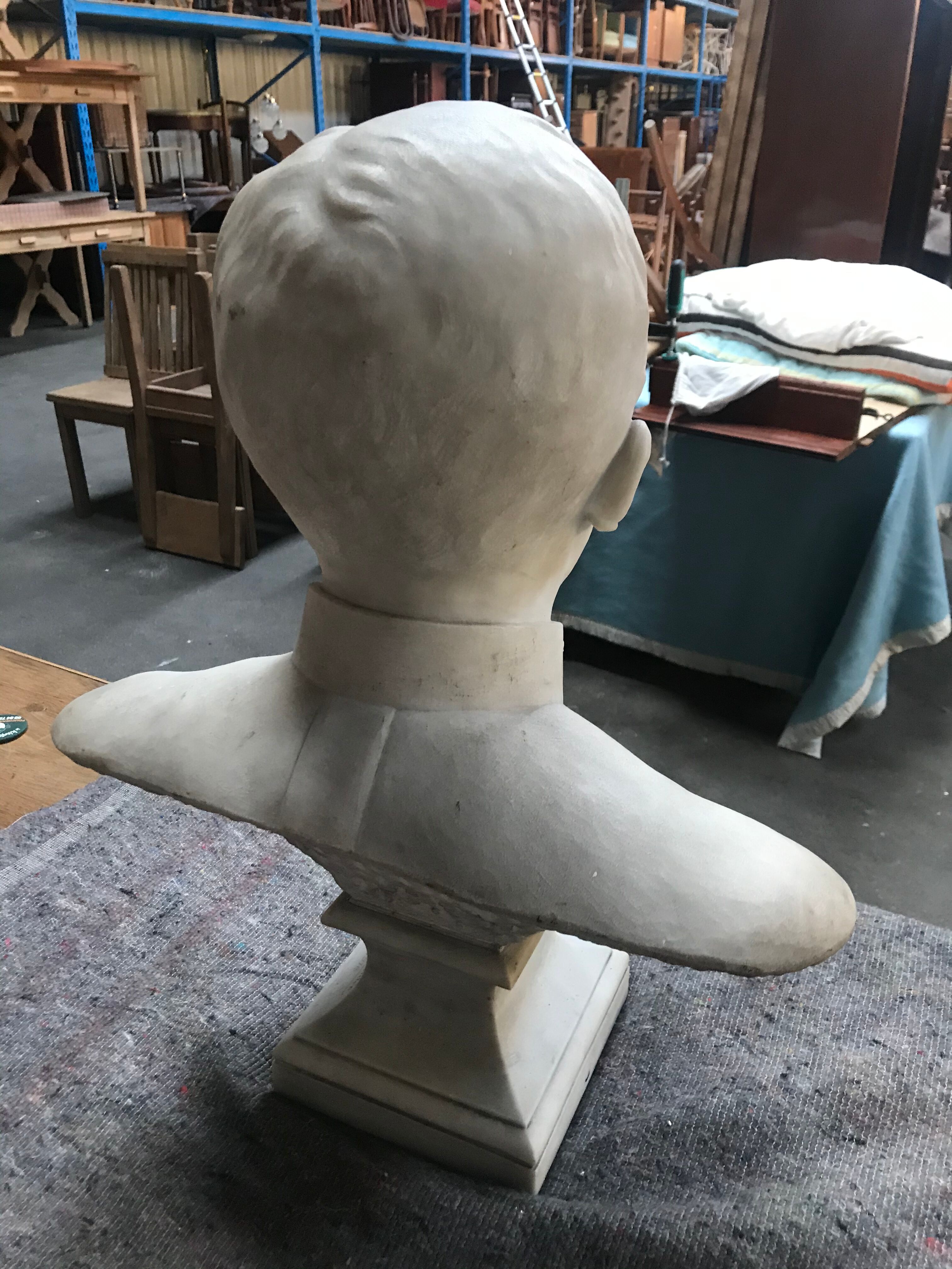 Man bust in square marble signed "F. Dezandes"