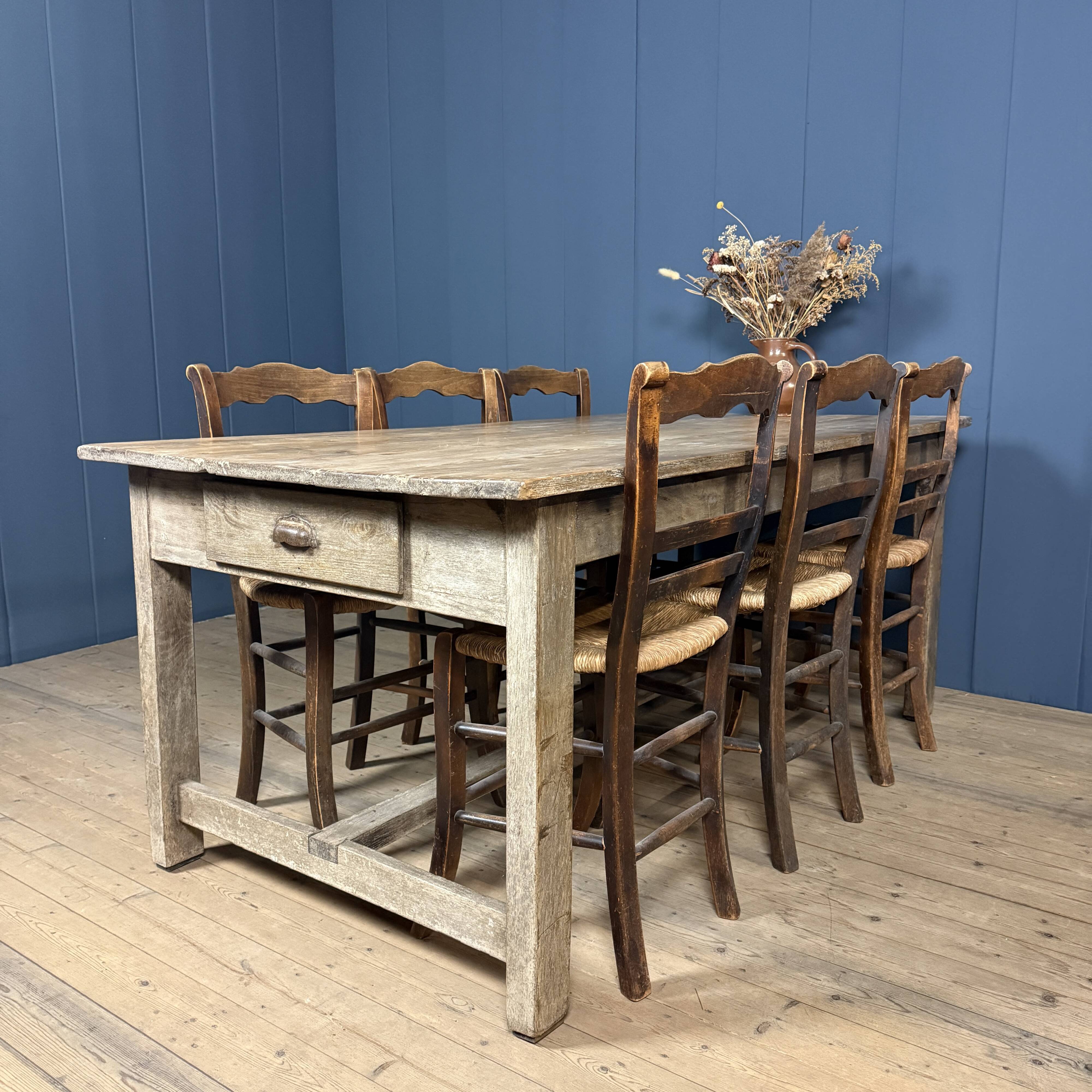 French farmhouse dining table with pine top and oak base