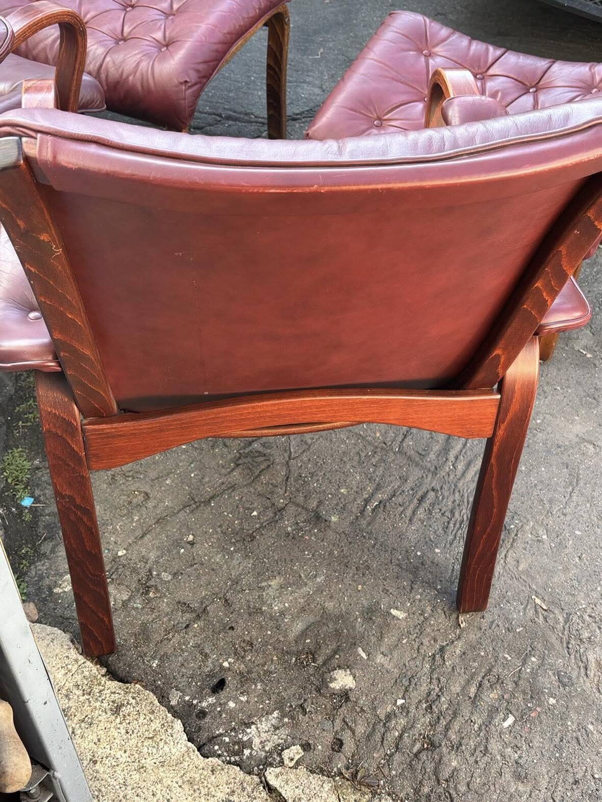 Scandinavian armchair with footrest