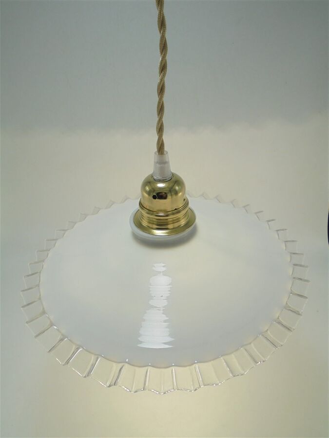 Toothed opaline suspension