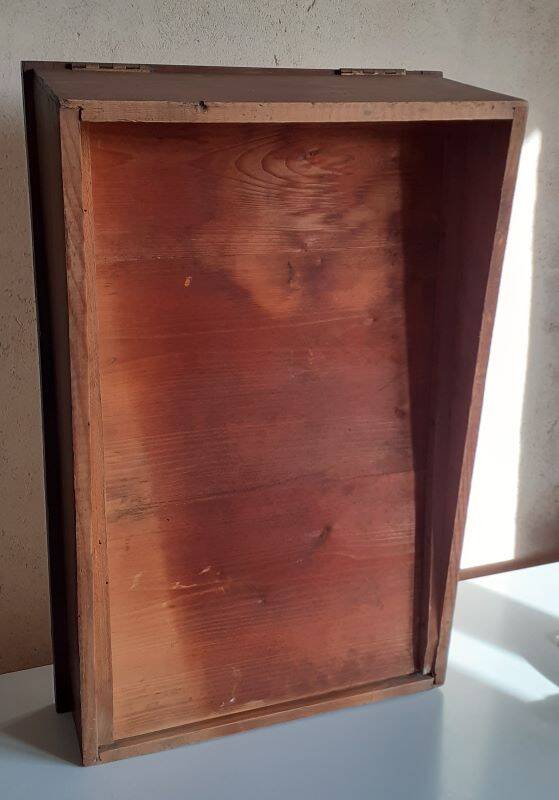 Old sloping pine display case