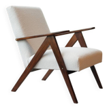 Fauteuil en tissu bouclette blanc et bois, milieu XXème