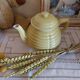 Old yellow earthenware teapot