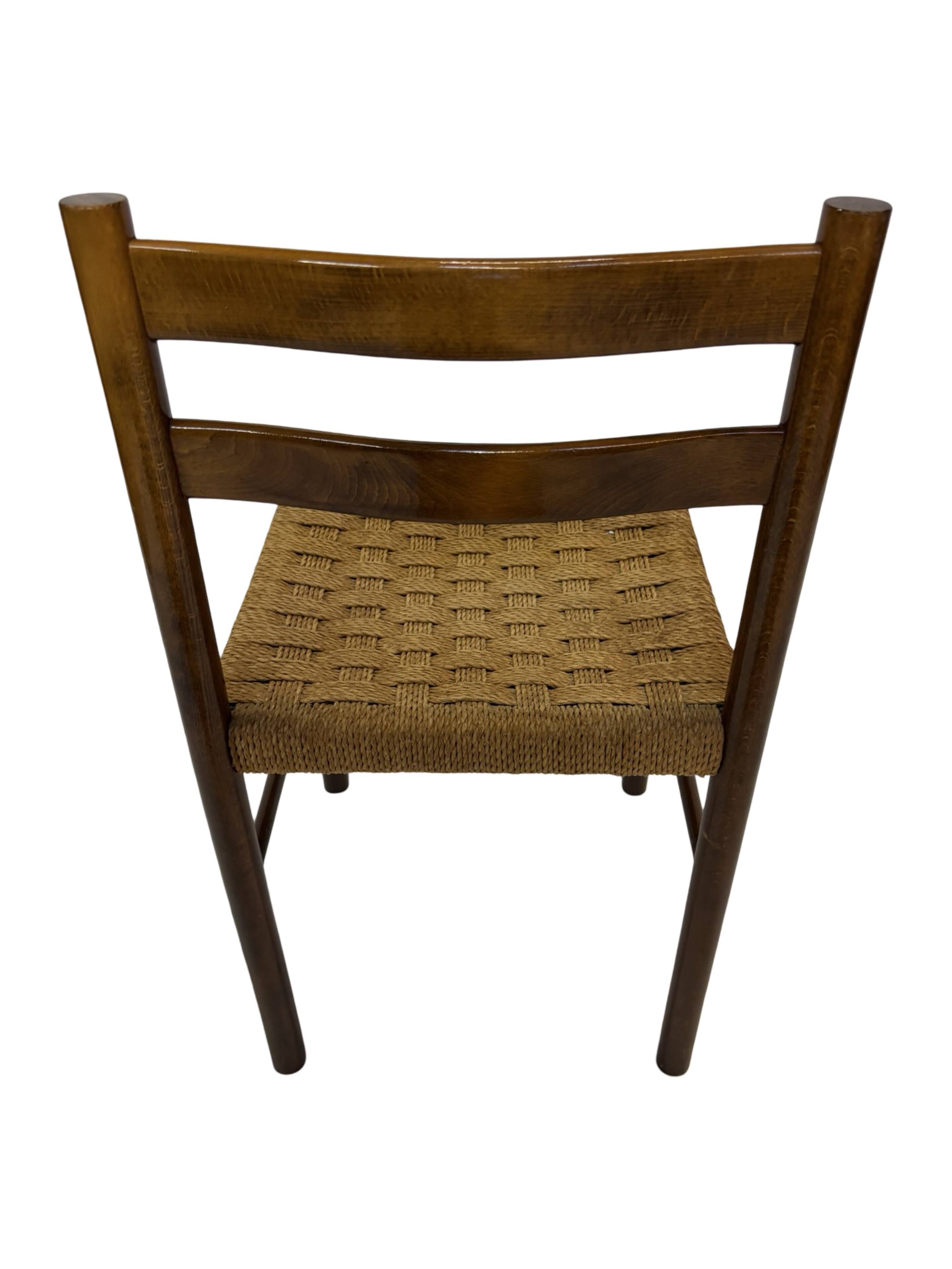Vintage chair from the 70s minimalist design in wood and paper cord