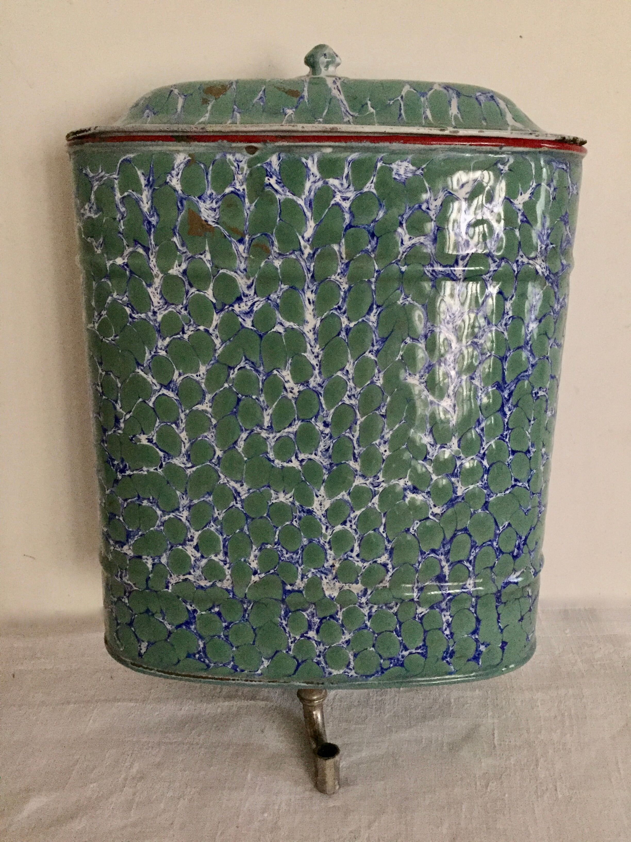 Old enamelled sheet metal wall fountain