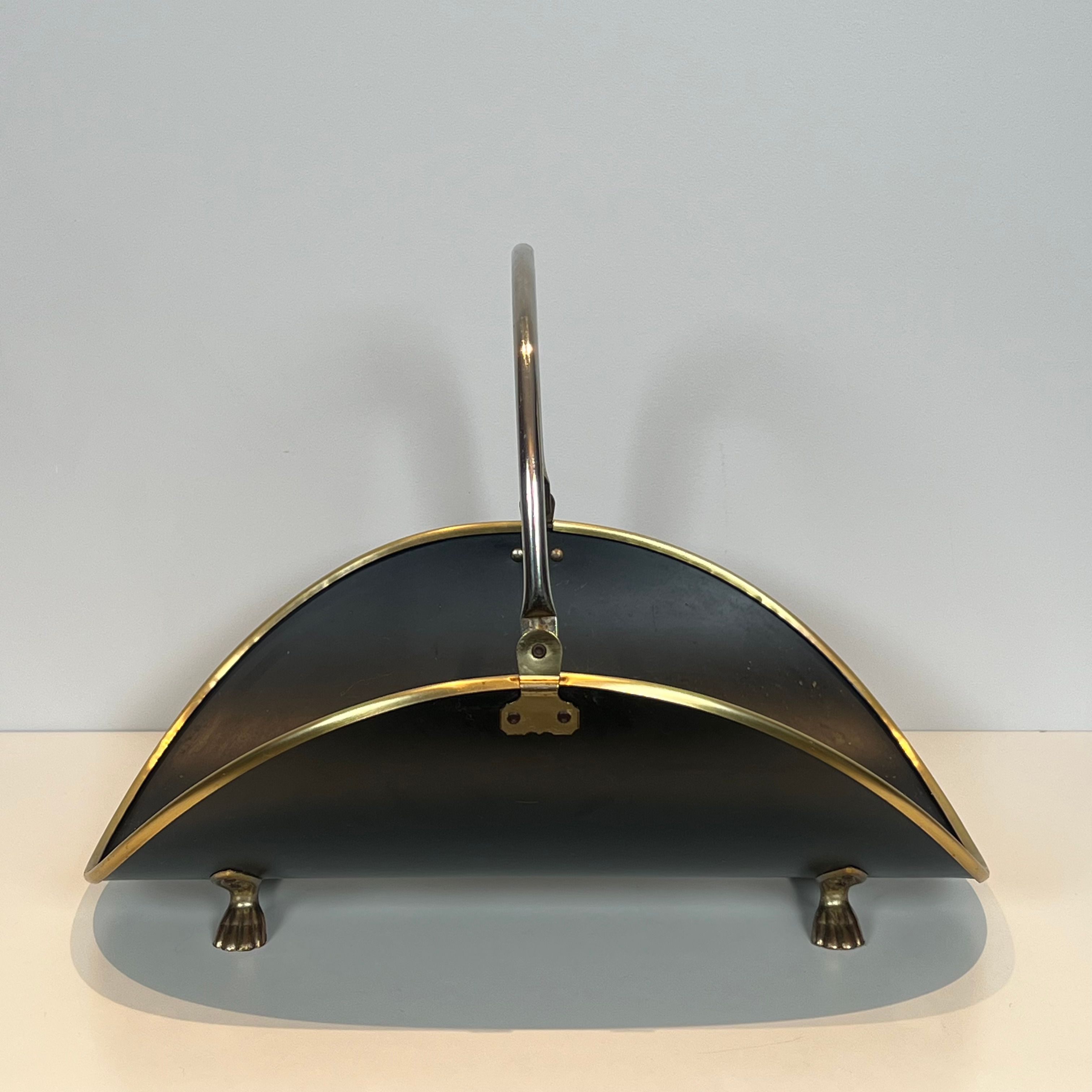 Neoclassical log holder in brass and black lacquered brass