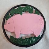 Cast iron underside, pink pig
