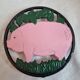 Cast iron underside, pink pig