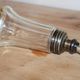 Vintage striped glass and patinated metal oil serving utensil.