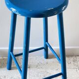Vintage wooden stool with electric blue paint