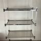 Vintage shelf in lucite, brass, and smoked glass from the 1970s.