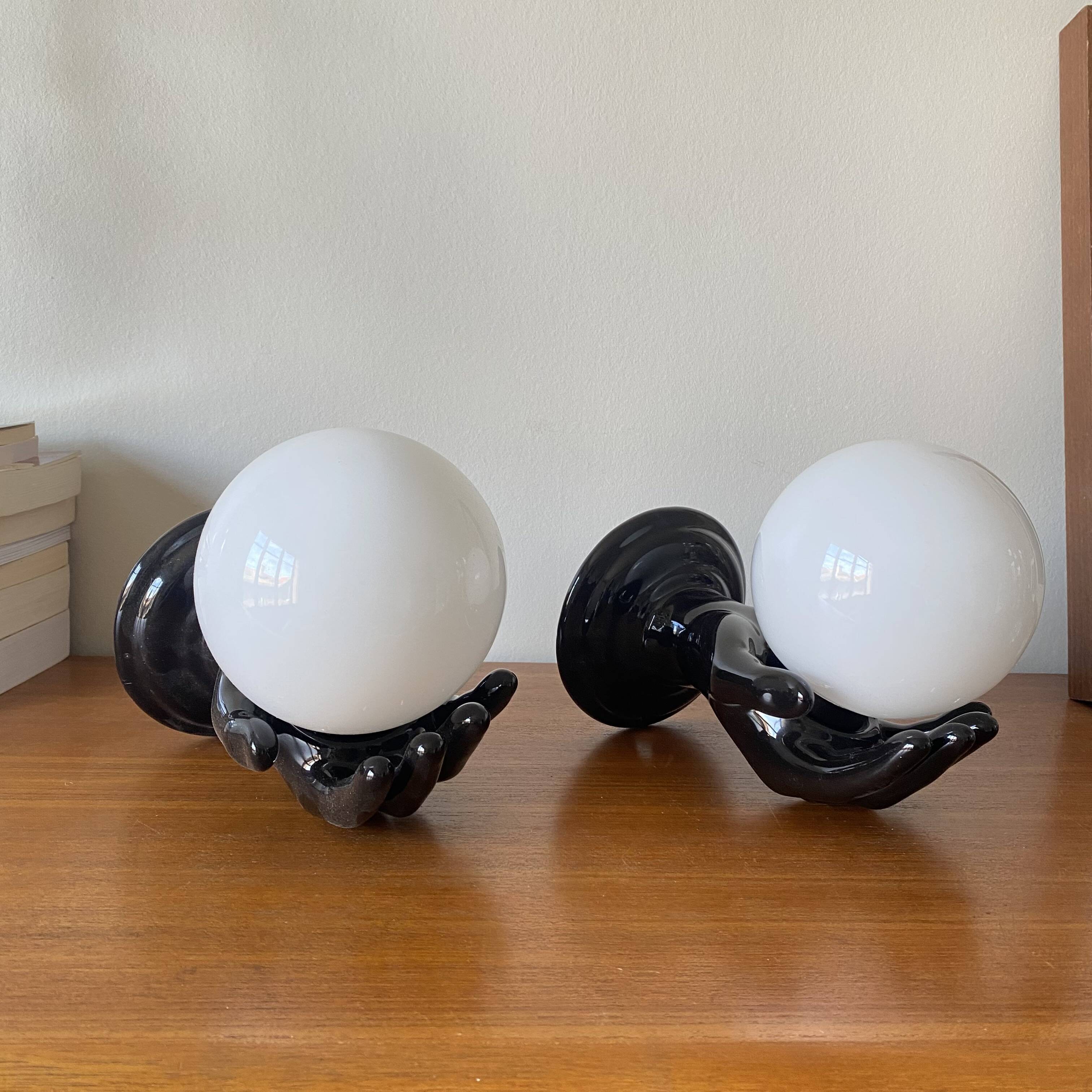 Pair of black ceramic wall lights from the 70s and 80s.